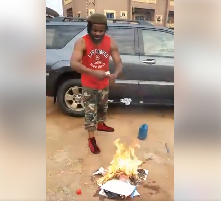 Nigerian Man Videos Self-Tearing and Burning Bibles [Photos/Videos]