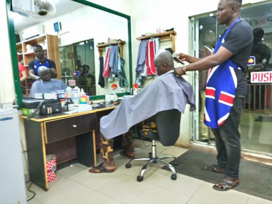 Governor, Fayose, Spotted, Having His Haircut at A Public Barbing Salon