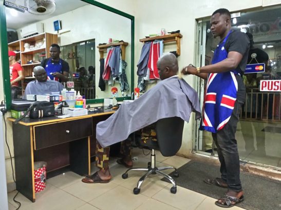 Governor, Fayose, Spotted, Having His Haircut at A Public Barbing Salon