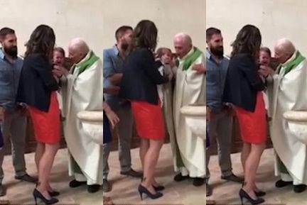 No nonsense Priest Hits Baby for Crying during Baptism [video]