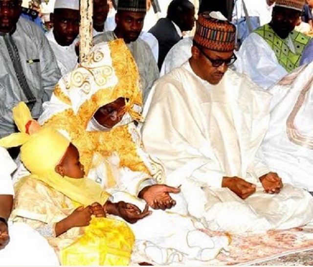 More Photos Of President Buhari As He Slaughters His Sallah Ram