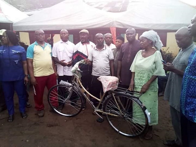 Popular Speaker from Abia State House of Assembly Empowers Old Woman with Bicycle [Photos]