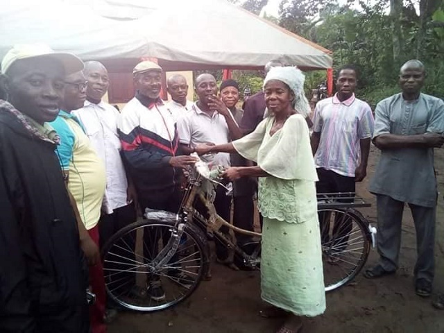 Popular Speaker from Abia State House of Assembly Empowers Old Woman with Bicycle [Photos]