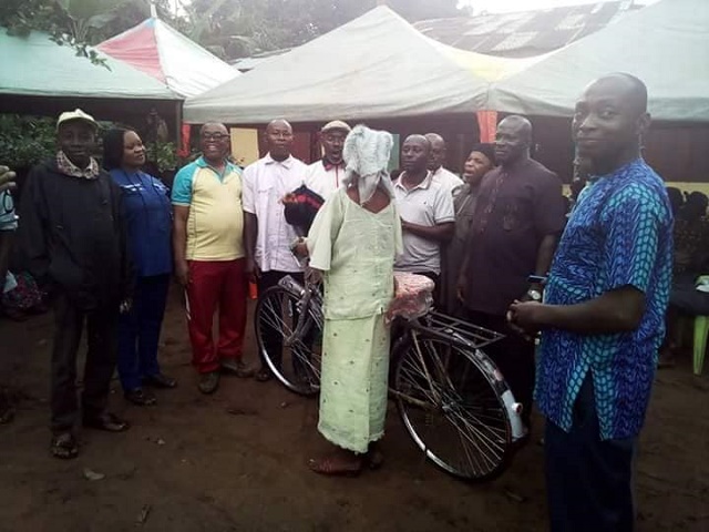 Popular Speaker from Abia State House of Assembly Empowers Old Woman with Bicycle [Photos]